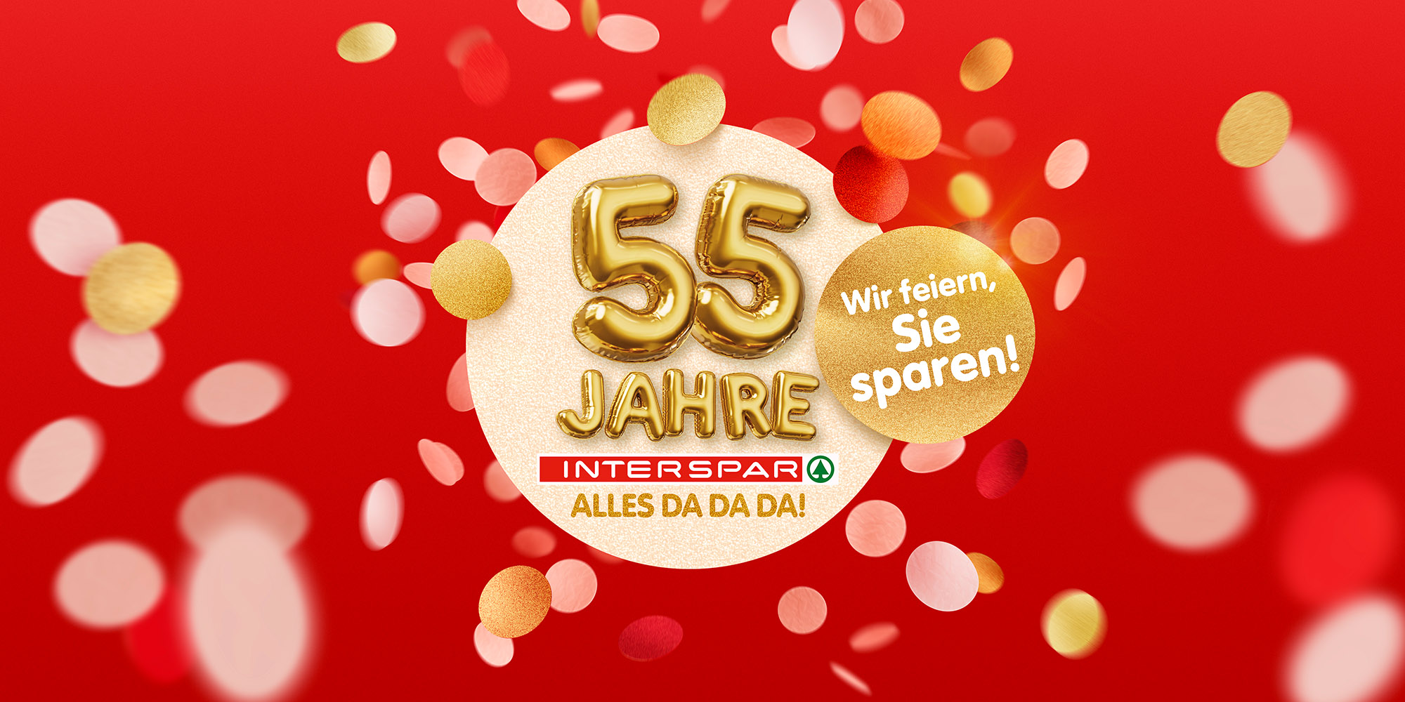 Ein Jubiläums-Visual mit goldenen Luftballons und Konfetti.